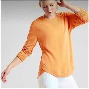 Athleta High Serenity Crisscross Sweatshirt Orange Soft Raglan Sleeve Curved Hem